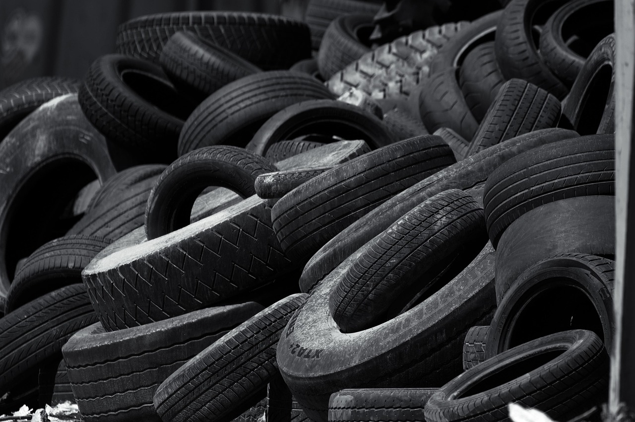 Stack of car tires at an auto repair and tire shop